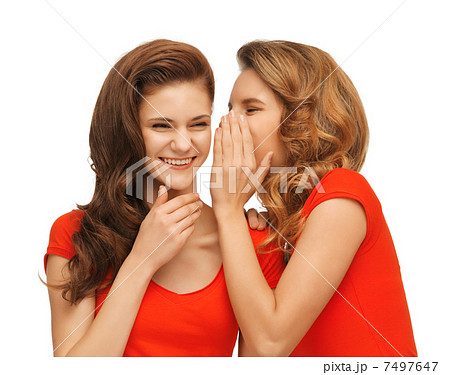 two talking teenage girls in red t-shirts 7497647