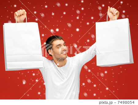 man with shopping bags man with shopping bags 7498054