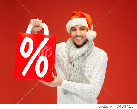 handsome man in christmas hat handsome man in christmas hat 7498416