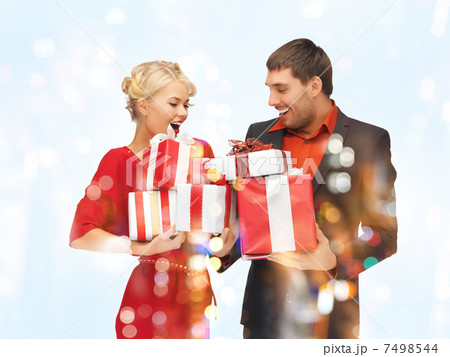 man and woman with gift boxes 7498544