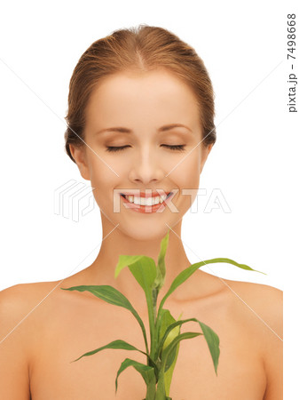 woman with green sprout woman with green sprout 7498668