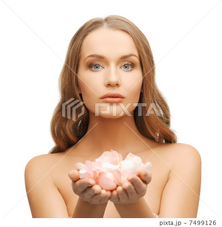beautiful woman with rose petals 7499126