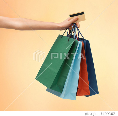 multi colored shopping bags and credit card 7499367