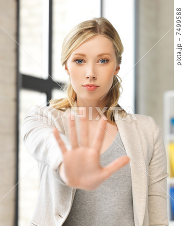 woman making stop gesture woman making stop gesture 7499588