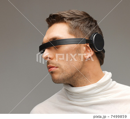 man with futuristic glasses 7499859