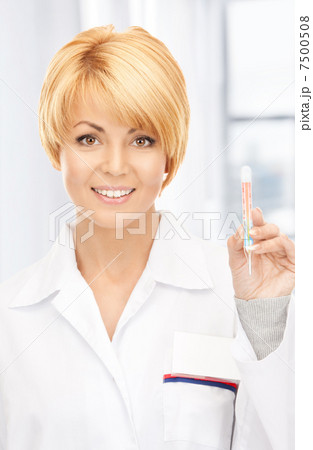 attractive female doctor with thermometer attractive female doctor with thermometer 7500508