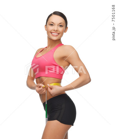 sporty woman with measuring tape 7501168