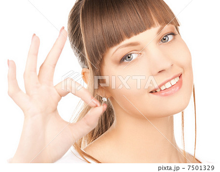 young woman showing ok sign young woman showing ok sign 7501329