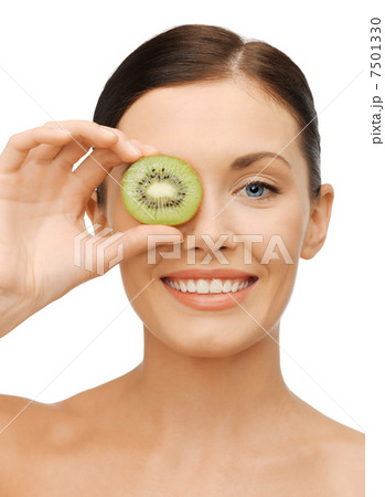 woman with kiwi slice woman with kiwi slice 7501330