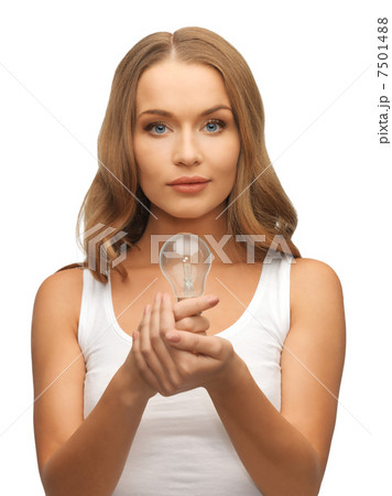 woman with energy saving bulb 7501488