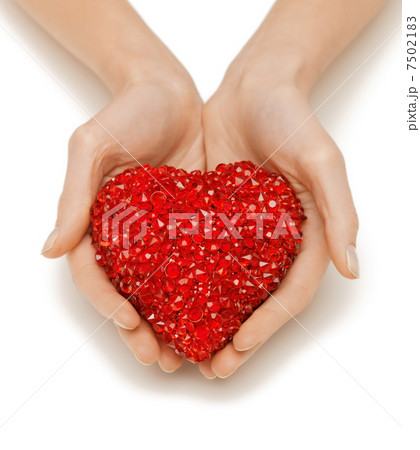 woman hands holding heart 7502183