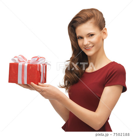 teenage girl in red dress with gift box 7502188