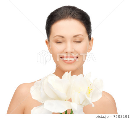 lovely woman with orchid flower 7502191