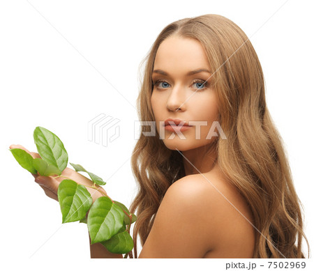 woman with green leaf 7502969