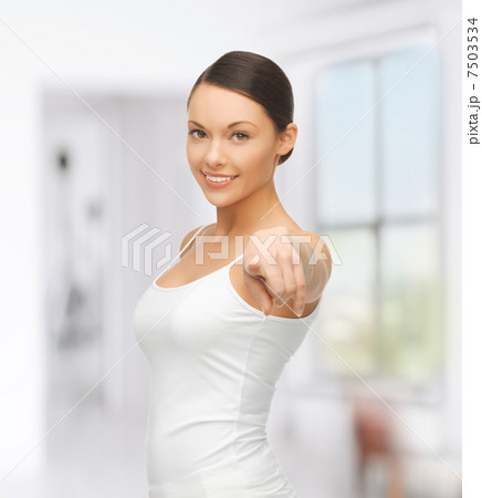 woman in blank white t-shirt pointing at you 7503534