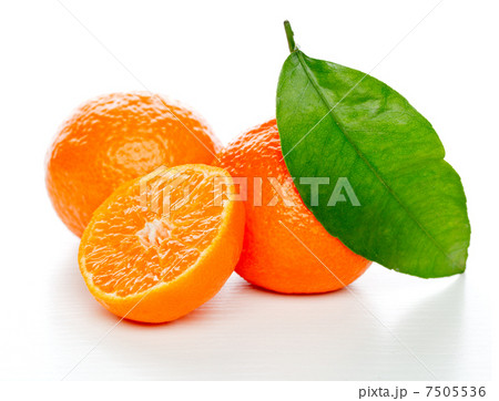 Tangerines with leaves isolated over white 7505536
