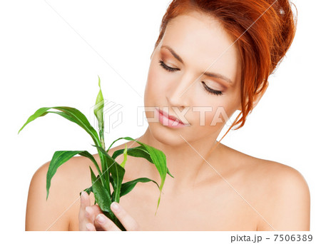 woman with green sprout woman with green sprout 7506389