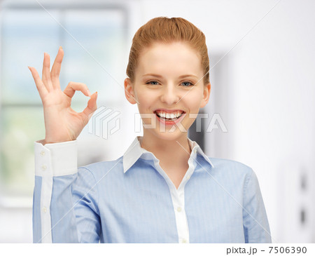 young woman showing ok sign young woman showing ok sign 7506390