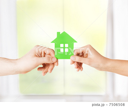 couple hands holding green house couple hands holding green house 7506508