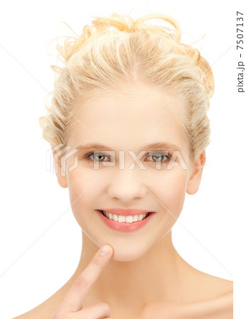 woman showing her teeth woman showing her teeth 7507137