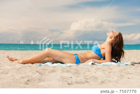 happy woman on the beach happy woman on the beach 7507770