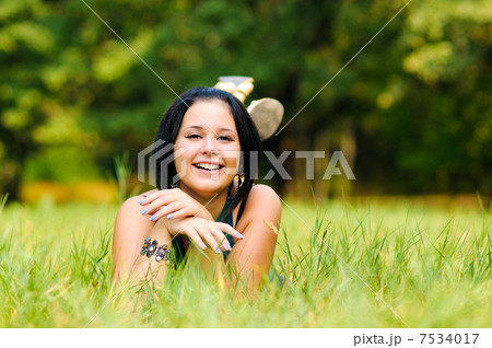 Pretty girl relaxing outdoor Pretty girl relaxing outdoor 7534017