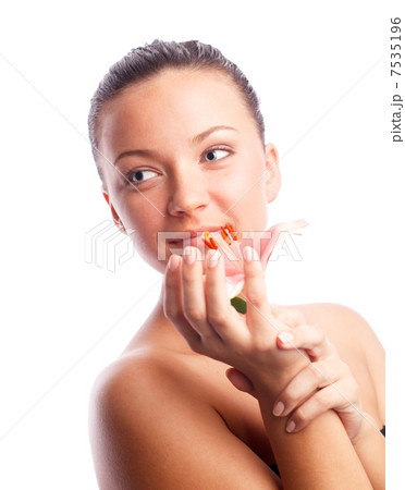 Woman with flower in hands 7535196