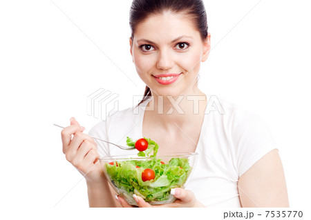 Young woman with healthy salad. Young woman with healthy salad. 7535770