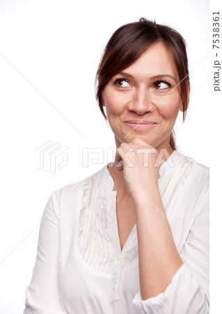 Thinking woman smiling looking up Thinking woman smiling looking up 7538361