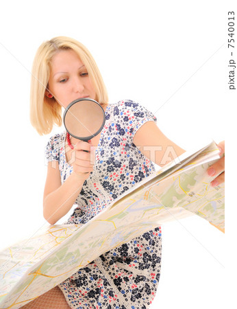 Attractive young blonde studying map 7540013