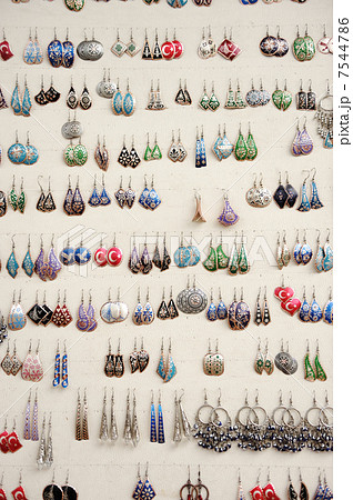 Ear rings on white background 7544786