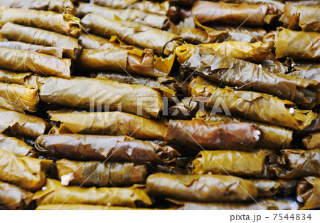 Homemade food in pot prepared for cooking, vegetable filled with a meat, grape leaves 7544834
