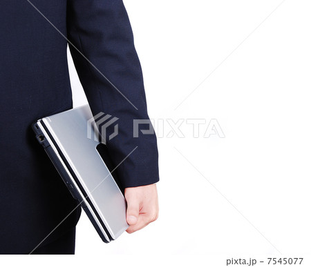 A young attractive male in suit with laptop 7545077