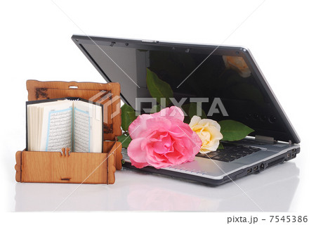 Beautiful roses, laptop and Islam holy book, put together isolated Beautiful roses, laptop and Islam holy book, put together isolated 7545386