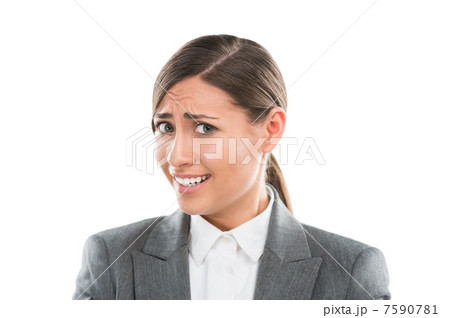 Portrait of shocked and confused business woman on white backgro 7590781