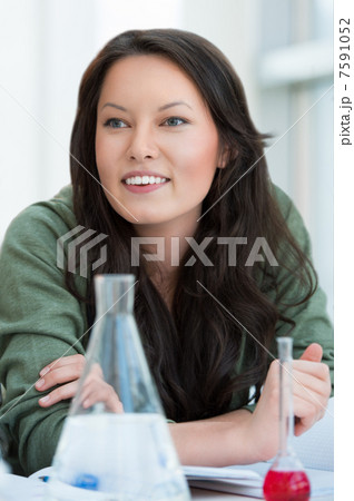 High School students. Pretty female student discussing while bra High School students. Pretty female student discussing while bra 7591052