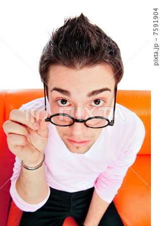 View from above of man in glasses looking at camera with hands o 7591904