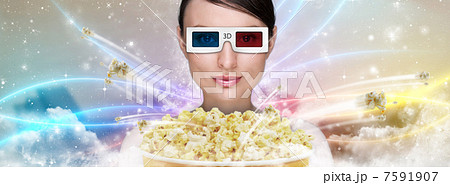 Portrait of young stylish modern woman wearing 3d glasses watchi 7591907