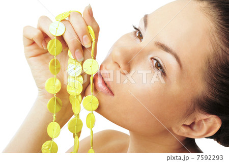 Pretty woman with yellow necklace Pretty woman with yellow necklace 7592293