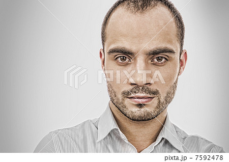 Fashion portrait of adult handsome business man looking at camer Fashion portrait of adult handsome business man looking at camer 7592478