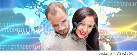 Portrait of young couple embracing. Standing against world map. 7592550