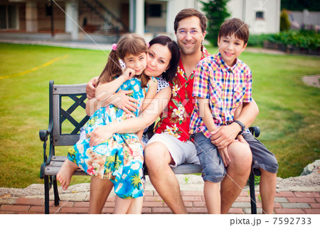 Artistic lifestyle photo of happy family having fun outdoors at Artistic lifestyle photo of happy family having fun outdoors at 7592733