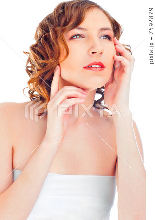 Young beautiful woman with long curly hairs - isolated on white 7592879