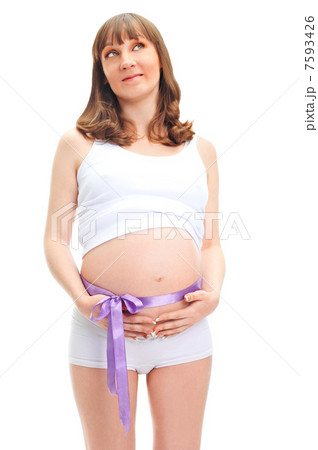 Image of pregnant woman touching her belly with hands Image of pregnant woman touching her belly with hands 7593426