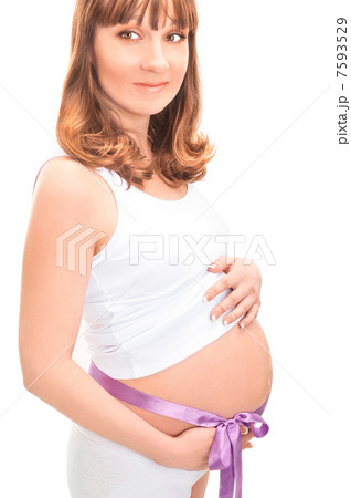 Image of pregnant woman touching her belly with hands Image of pregnant woman touching her belly with hands 7593529