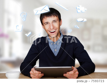 A businessman with icons floating around his head. Portrait of h A businessman with icons floating around his head. Portrait of h 7593723