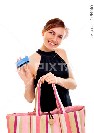 Portrait of a happy young woman woman with her handbag 7594665