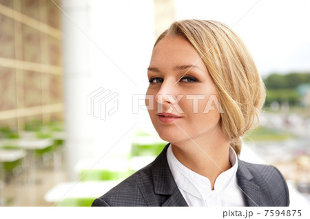 Closeup portrait of cute young business woman smiling Closeup portrait of cute young business woman smiling 7594875