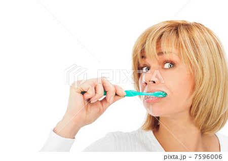 Detail portrait of a happy mature woman brushing her teeth 7596006