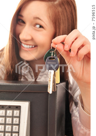 Closeup portrait of young pretty woman at her desk with deposit Closeup portrait of young pretty woman at her desk with deposit 7596515